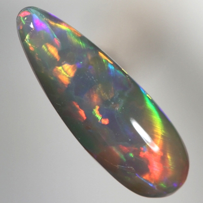 SOLID SEMI BLACK OPAL Very bright rolling flashes SEE VIDEO